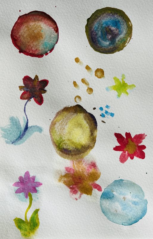 Watercolour exercise: colourful circles and flower sketches on watercolour paper